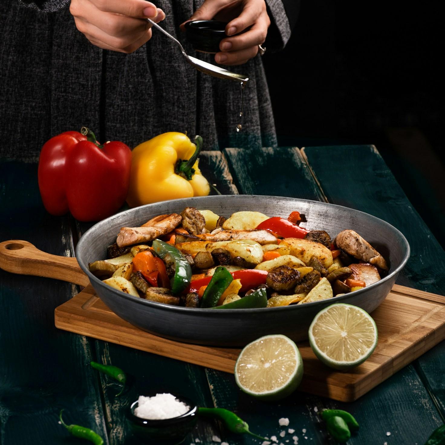 Community members collaborating in a contemporary kitchen, sharing recipes and techniques